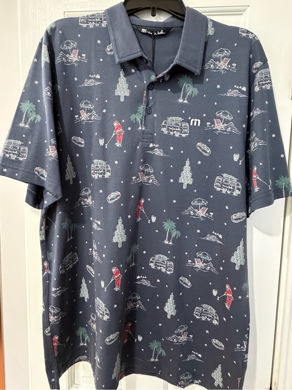 Men's Travis Mathew’s Navy Christmas Printed Polo Shirt